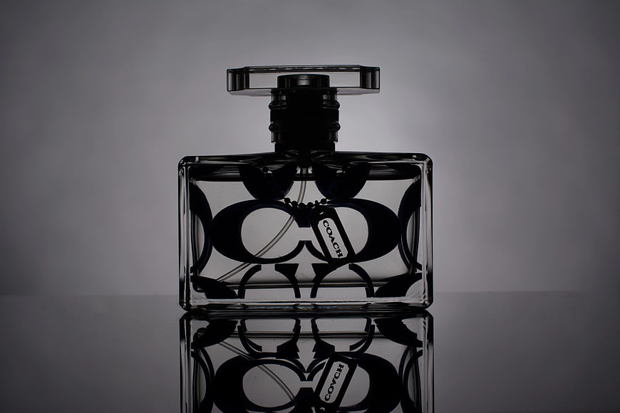 Black and White Perfume Bottle with Reflection
