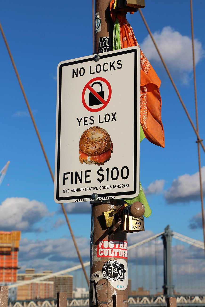 Humorous NYC No Locks Sign with Bagel Sticker