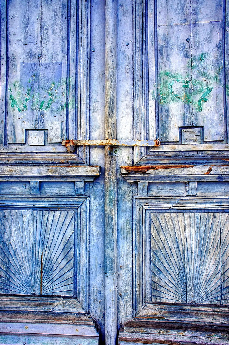 Weathered Blue Wooden Double Doors with Rusty Lock