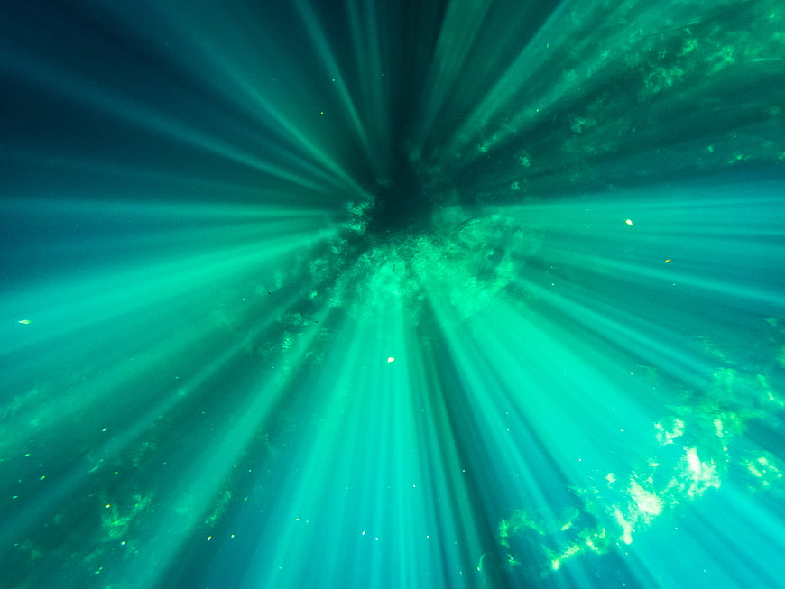 Underwater Sun Rays in Turquoise Water