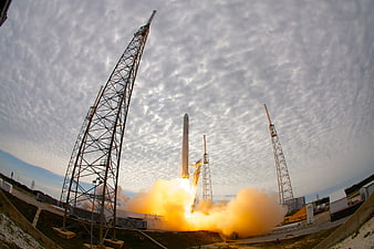 Rocket Launch Liftoff with Smoke and Clouds