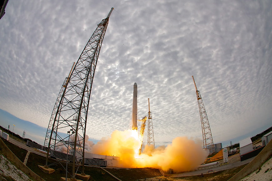 Rocket Launch Liftoff with Smoke and Clouds