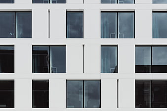 Modern White Building Facade with Grid Windows