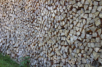 Stacked Firewood Wall Texture Background