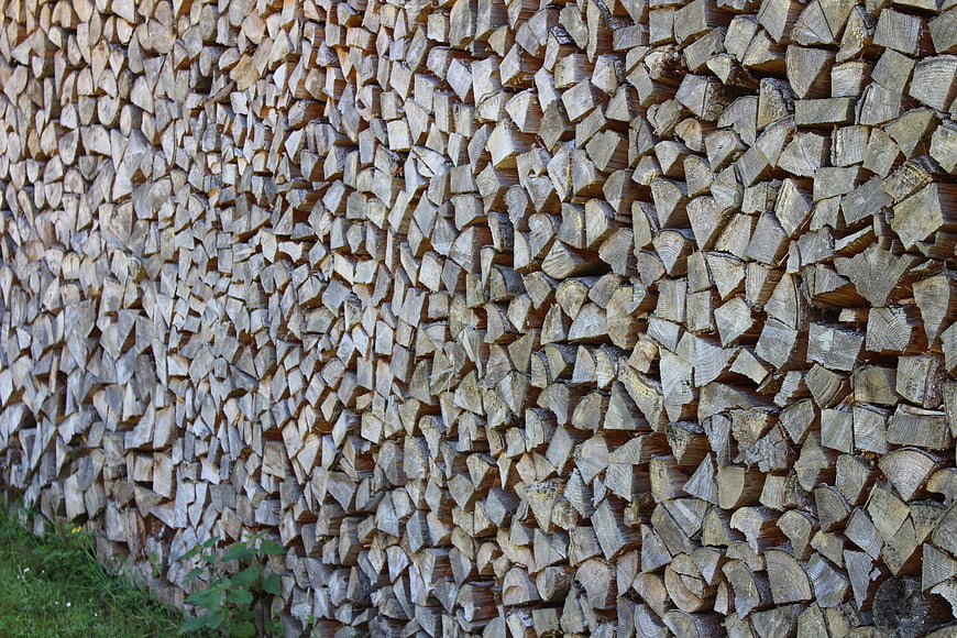 Stacked Firewood Wall Texture Background