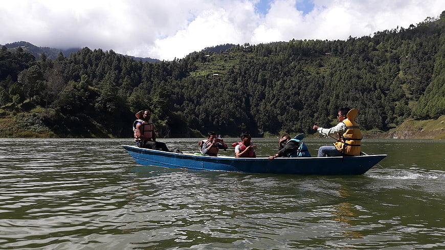 Group of tourists boating on a lake in Nepal