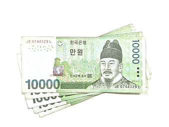Fan of South Korean 10,000 Won Banknotes on White Background