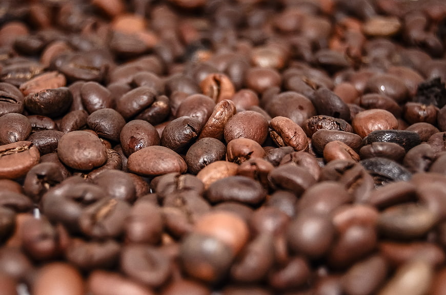 Close-up of roasted coffee beans with shallow depth of field