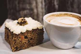 Carrot Cake Slice and Cappuccino Coffee