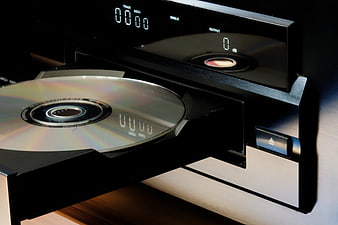 Close-up of CD Player with Disc Ejected and Digital Display