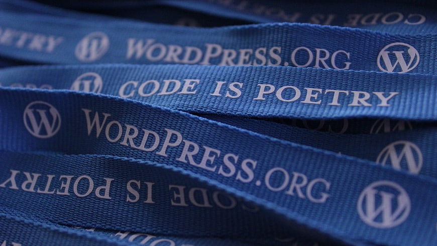 Blue WordPress Lanyards with Code Is Poetry Text