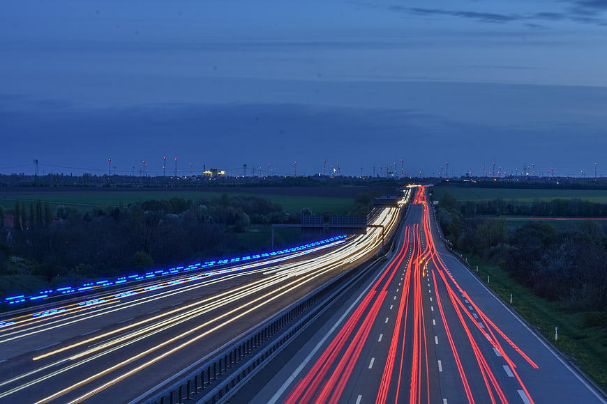 Long exposure highway traffic light trails at dusk