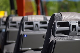 Empty bus seats interior with blurred background