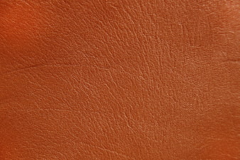 Close-up texture of orange leather material background