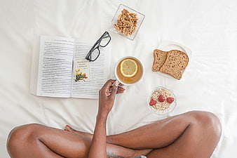 Top View Black Woman Breakfast in Bed with Book