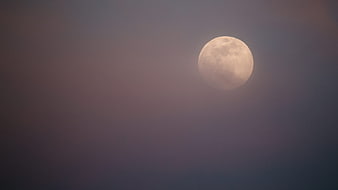 Full Moon in Hazy Purple and Blue Twilight Sky