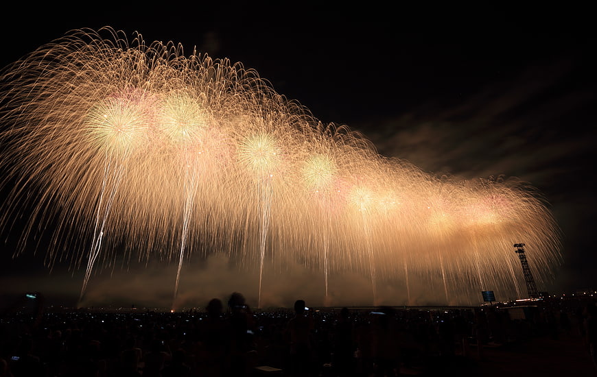 Spectacular Golden Fireworks Display Over Night Sky