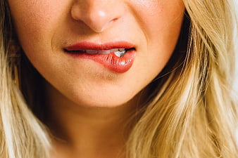 Close-up of Woman's Lips with Red Lipstick