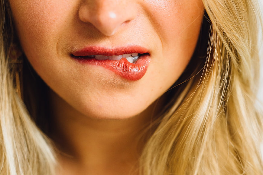 Close-up of Woman's Lips with Red Lipstick