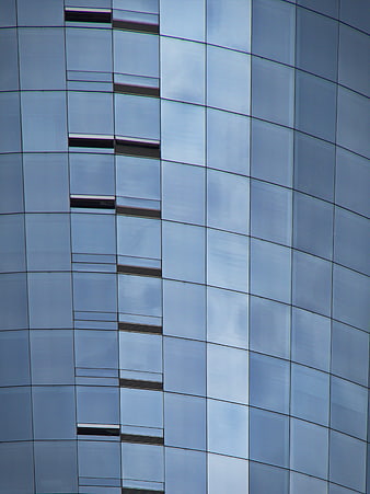 Abstract Blue Glass Office Building Facade with Sky Reflections