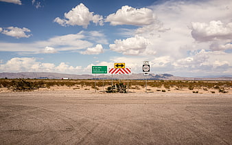 Desert Road Signs for Socorro and Truth or Consequences