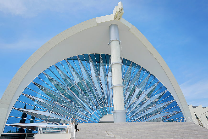 Modern White Mosque with Blue Glass Dome and Minaret
