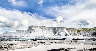 Dramatic White Cliffs and Rocky Beach Landscape