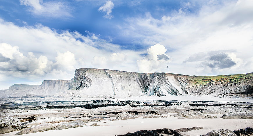Dramatic White Cliffs and Rocky Beach Landscape