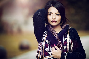 Portrait of Young Woman in Patterned Knit Sweater