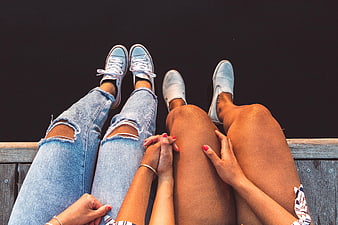 Top View of Couple Holding Hands on Wooden Bench