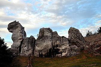 Dramatic limestone rock formations with people on top