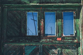 Weathered Green Wooden Window with Blue Sky Reflection