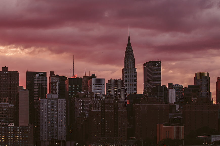 Dramatic Pink Sunset Over New York City Skyline with Chrysler Building