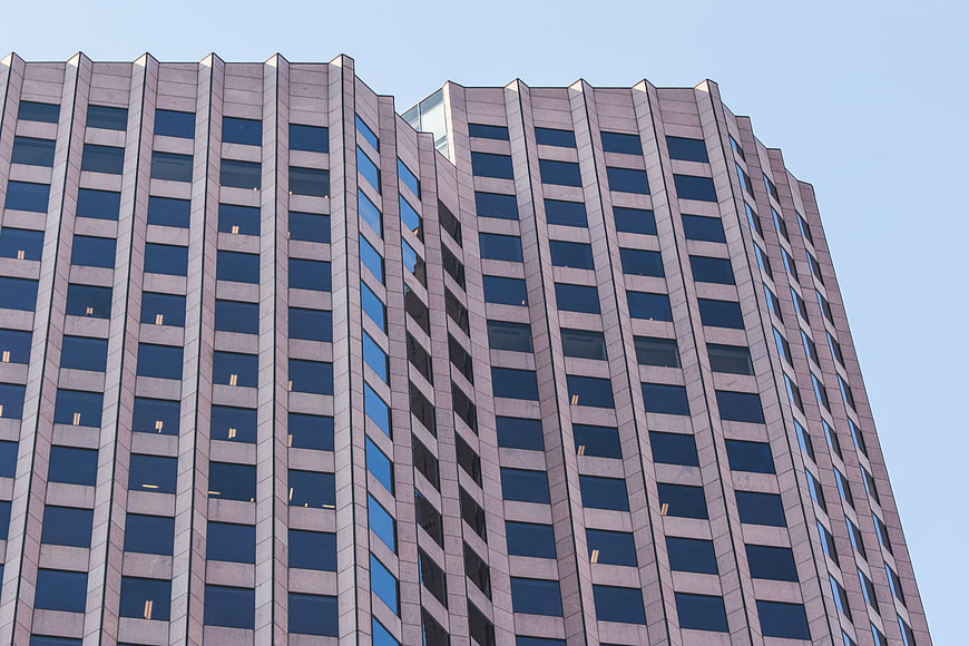Low angle view of modern office building facade