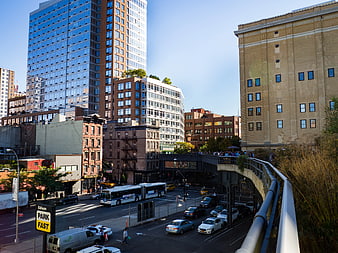 Elevated Park Walkway Over Busy City Street