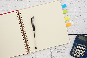 Blank Notebook, Pen, and Calculator on White Wooden Desk