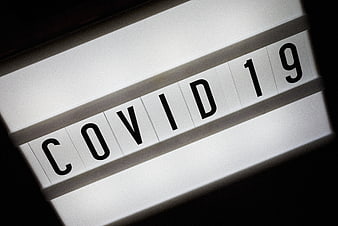 Flip Clock Displaying COVID 19 Text