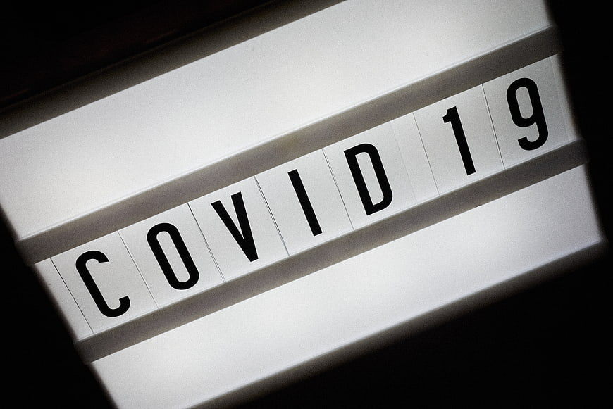 Flip Clock Displaying COVID 19 Text