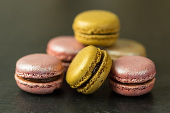 Colorful Macarons on Dark Surface