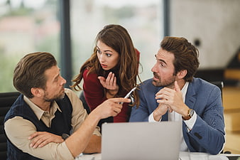 Business Team Arguing and Discussing Strategy in Office Meeting