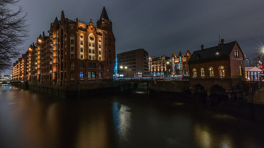 Night view of Speicherstadt Hamburg with canal reflections