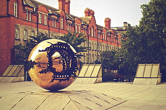 Golden Sphere Sculpture in Dublin University Courtyard