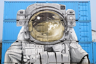 Astronaut Graffiti Mural on Blue Shipping Containers