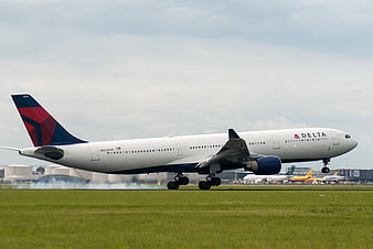 Delta Air Lines Boeing 767 Landing at Airport Runway