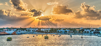 Dramatic Sun Rays Over Cozumel Harbor At Sunset