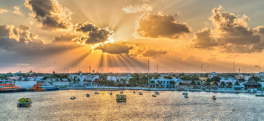 Dramatic Sun Rays Over Cozumel Harbor At Sunset