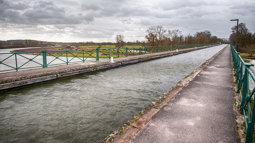 Green metal bridge over Roanne-Digoin canal in Burgundy, France