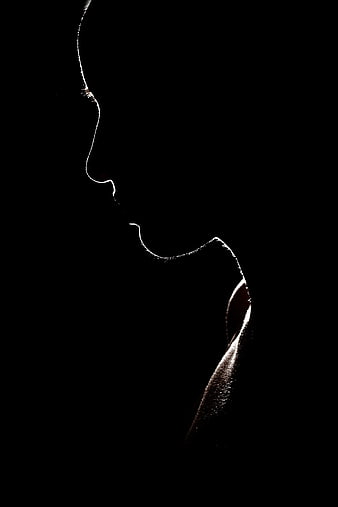 Silhouette of a woman's profile in black and white
