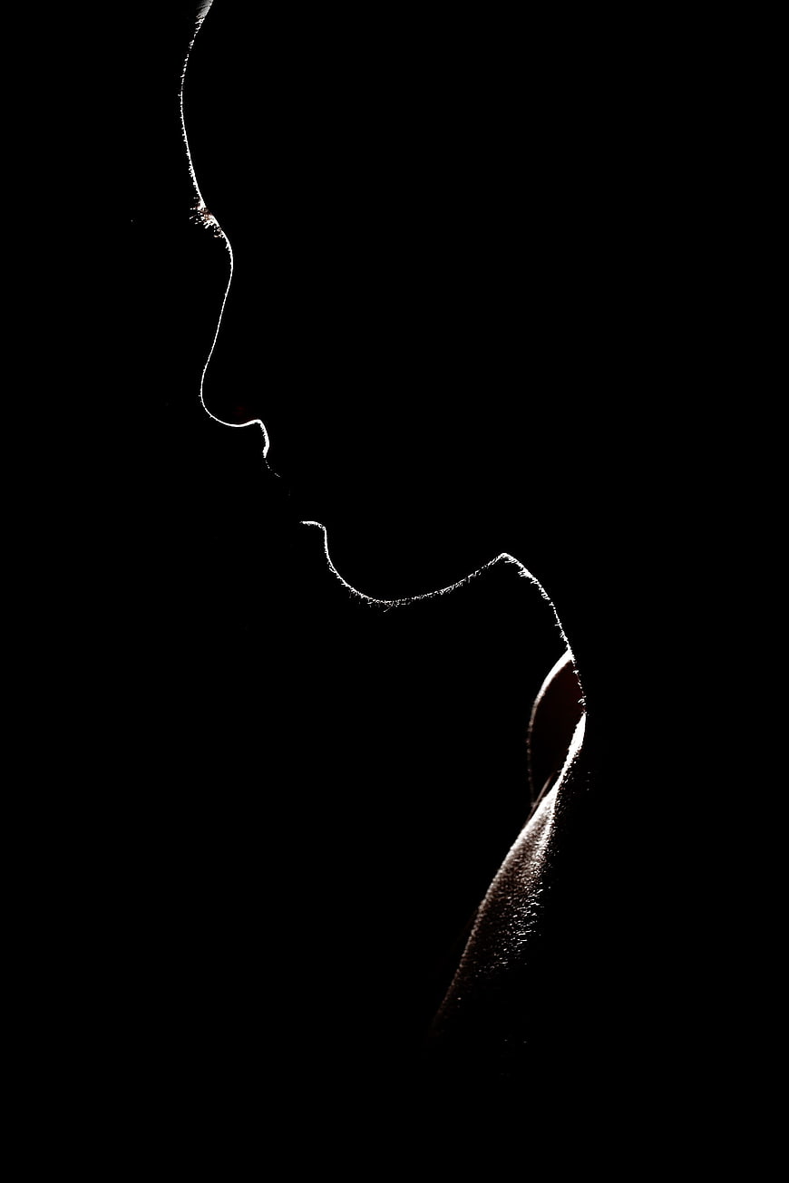 Silhouette of a woman's profile in black and white