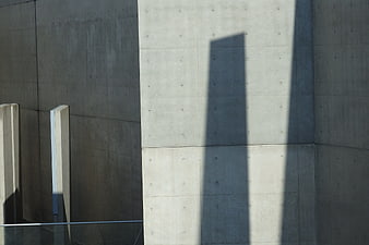 Modern Concrete Architecture with Geometric Shadows